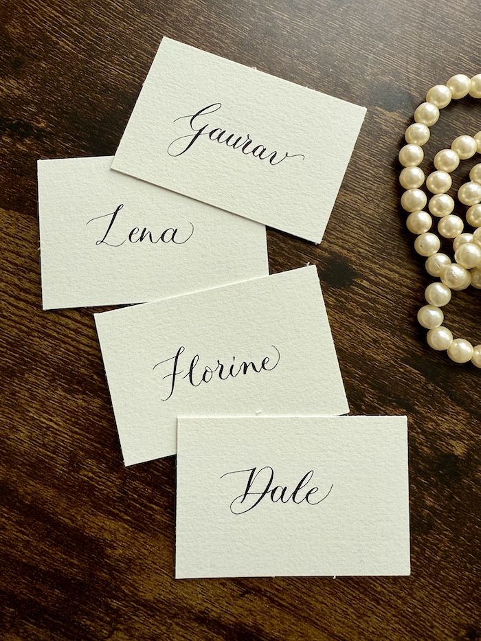 Hand painted calligraphy wedding place cards